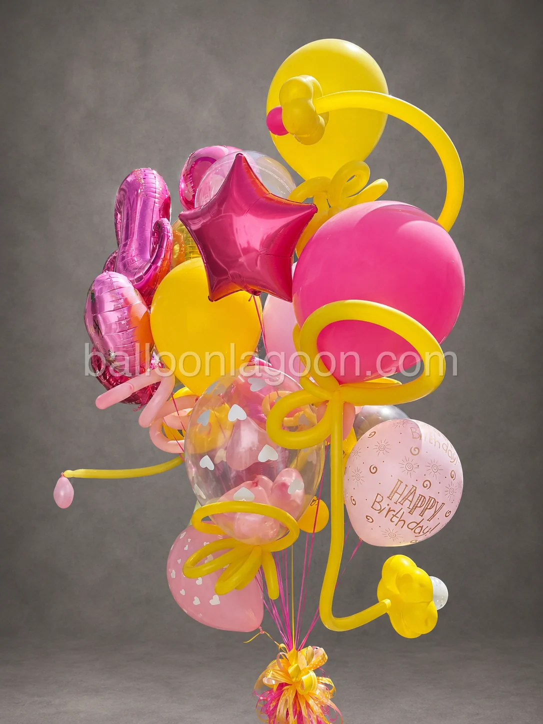 Pastel balloon columns installed at an event entrance in Los Angeles