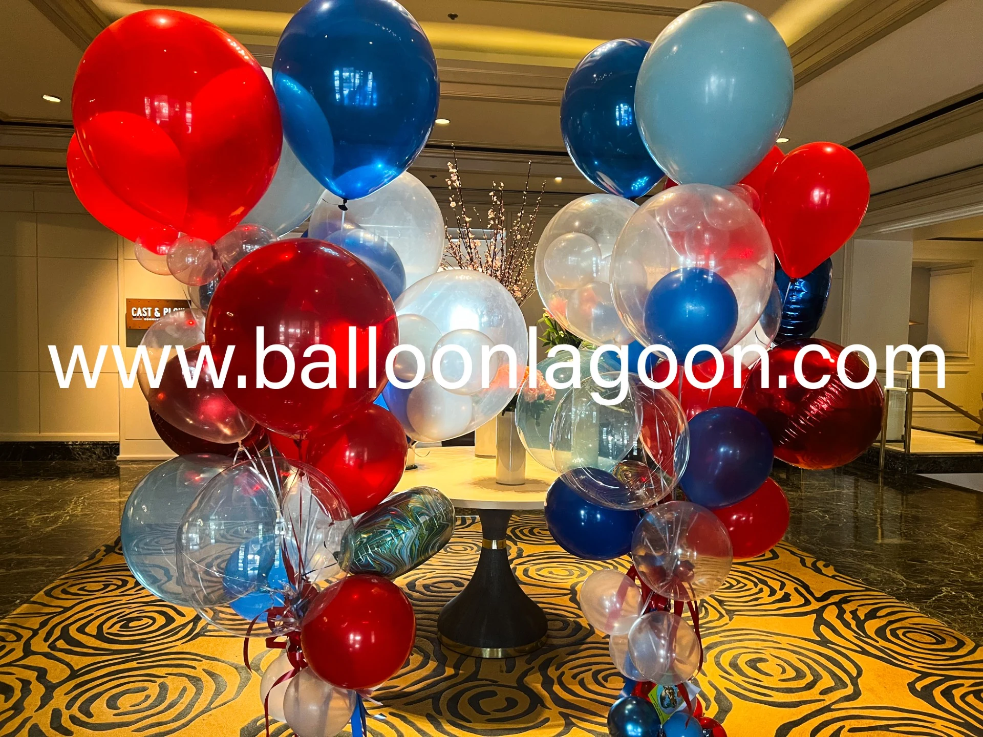 Freedom 4th of July balloon arrangement with patriotic red white and blue decorations