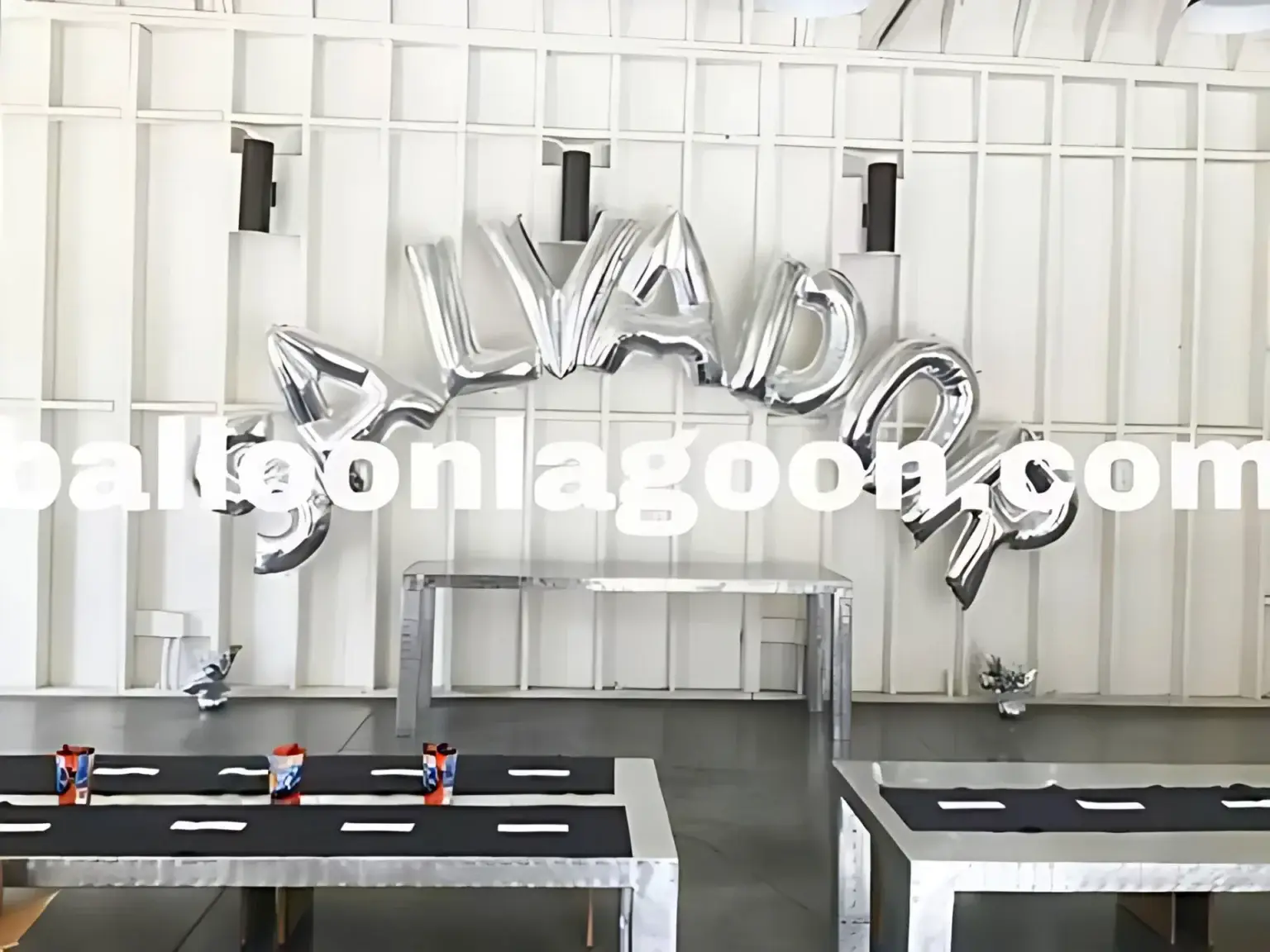 Modern silver letter balloons spelling Salvador for stylish birthday event in Beverly Hills